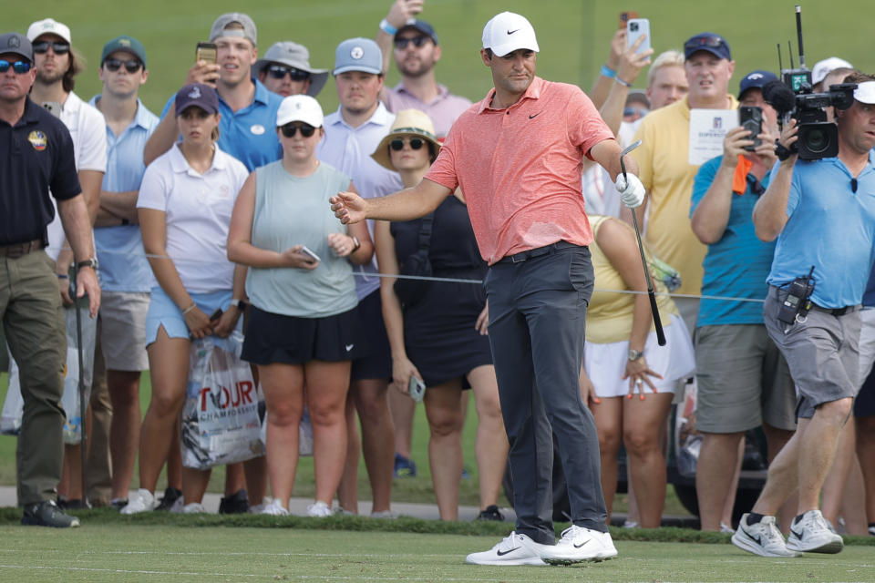 Scottie Scheffler reacts after a shot on the 15th hole during the first round of the Tour Championship golf tournament at East Lake Golf Club, Thursday, Aug. 24, 2023, in Atlanta. (AP Photo/Alex Slitz)