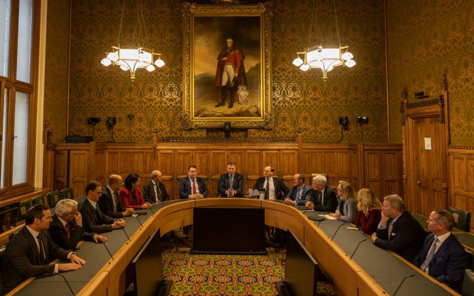 The executive of the 1922 Committee chaired by Sir Graham Brady meets in the House of Commons exactly 100 years after it first met