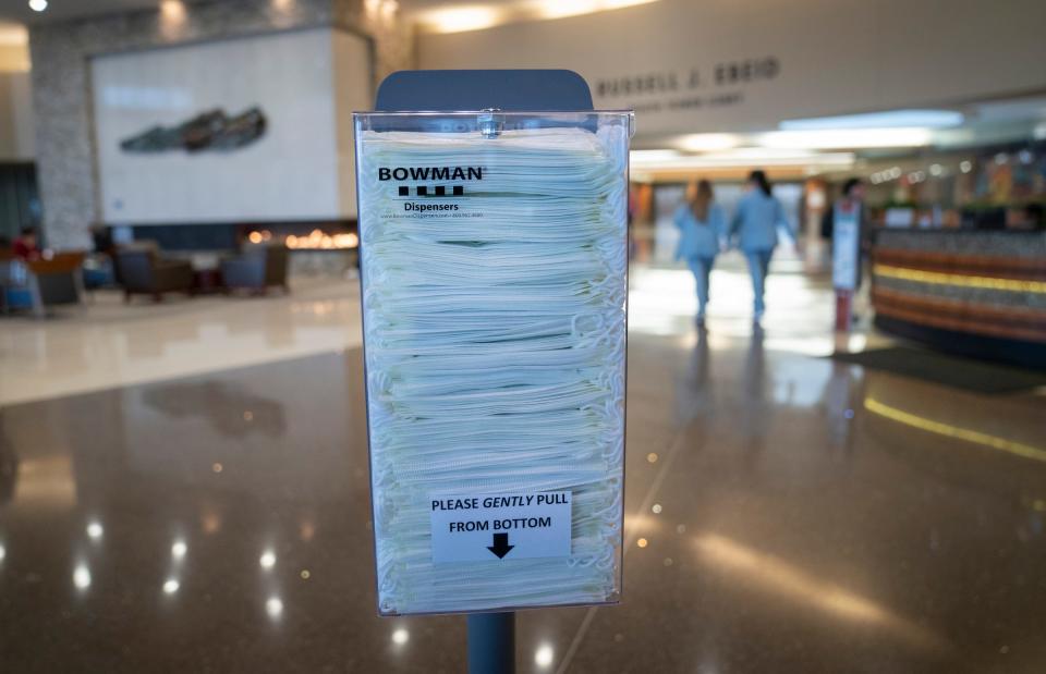 Mask kiosks can be found throughout Trinity Health Oakland Hospital in Pontiac on April 21, 2023. They have relaxed their masking mandates for staff and patients.