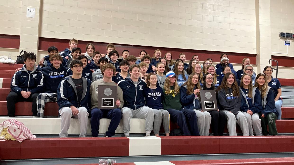 The Chatham boys and girls swim teams celebrate after winning the Morris County Championships on Jan. 20, 2024.