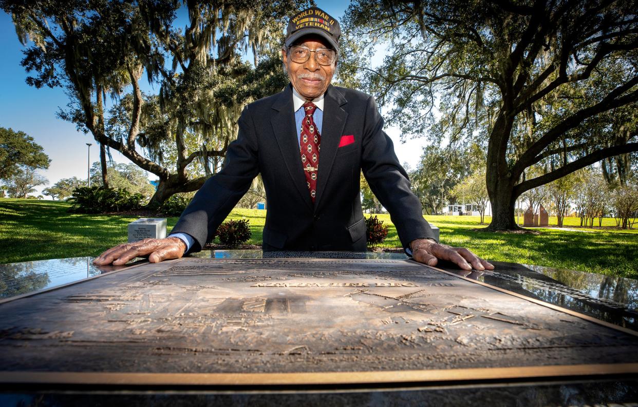 Herman Jenkins, a World War II veteran, is shown in 2021 at a monument installed in Lakeland's Veterans Park to honor Black members of "The Greatest Generation." Jenkins, who served in Europe during World War II, died Friday at age 104.