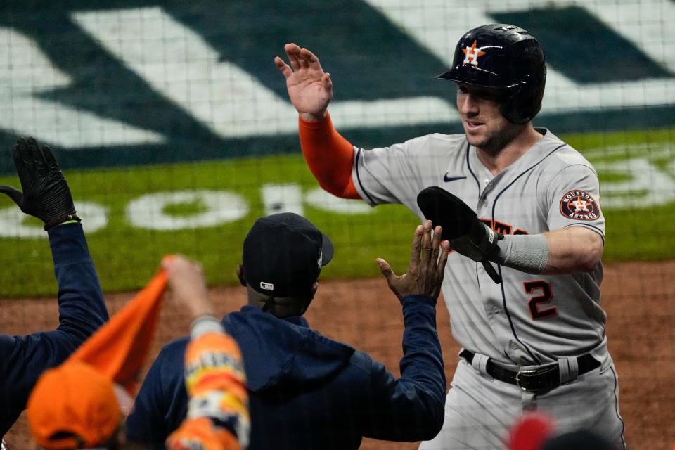 Alex Bregman reacts after scoring a run in the fifth inning.