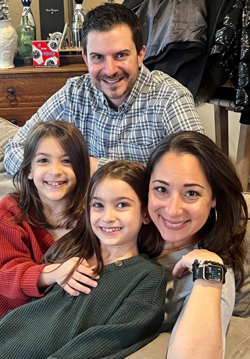 PHOTO: David Speal said he has mostly recovered but still has questions about why some people recover from long COVID and others do not. Speal is pictured with his wife, Jennifer, and twin daughters Natalie and Olivia. (Courtesy David Speal)