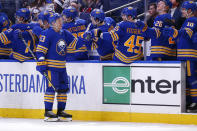 Buffalo Sabres left wing Jeff Skinner (53) is congratulated for his goal during the second period of the team's NHL hockey game against the Carolina Hurricanes, Tuesday, April 5, 2022, in Buffalo, N.Y. (AP Photo/Jeffrey T. Barnes)