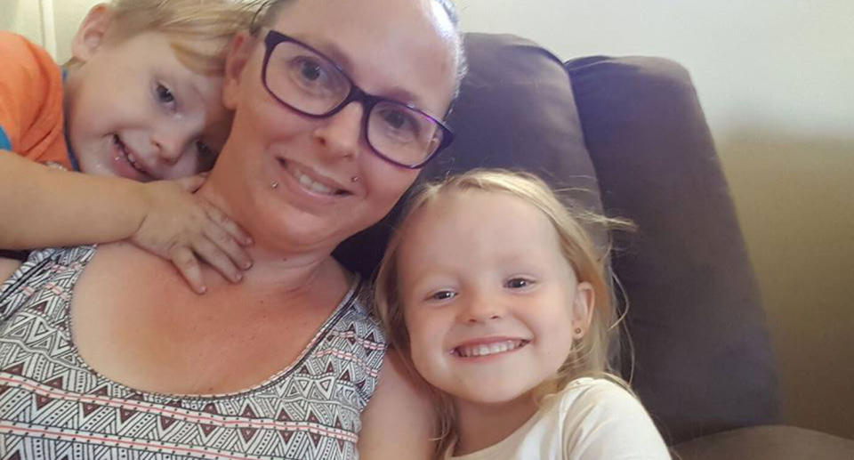 Charmaine Harris McLeod with one of her daughters and one of her sons. Both these children died with two others in a head-on crash near Kingaroy along with their mother.