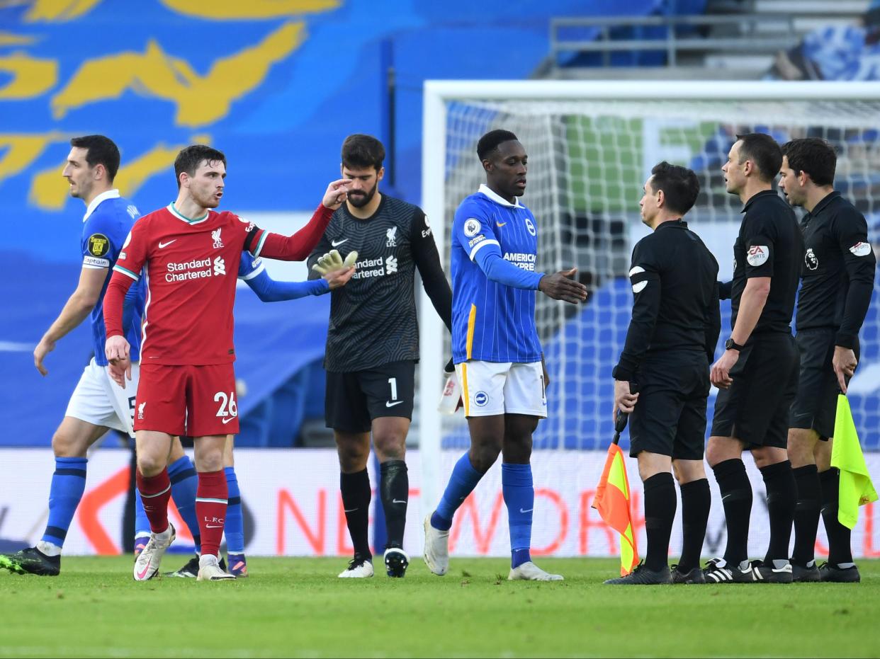 Andrew Robertson complains about Brighton’s penalty (Getty Images)