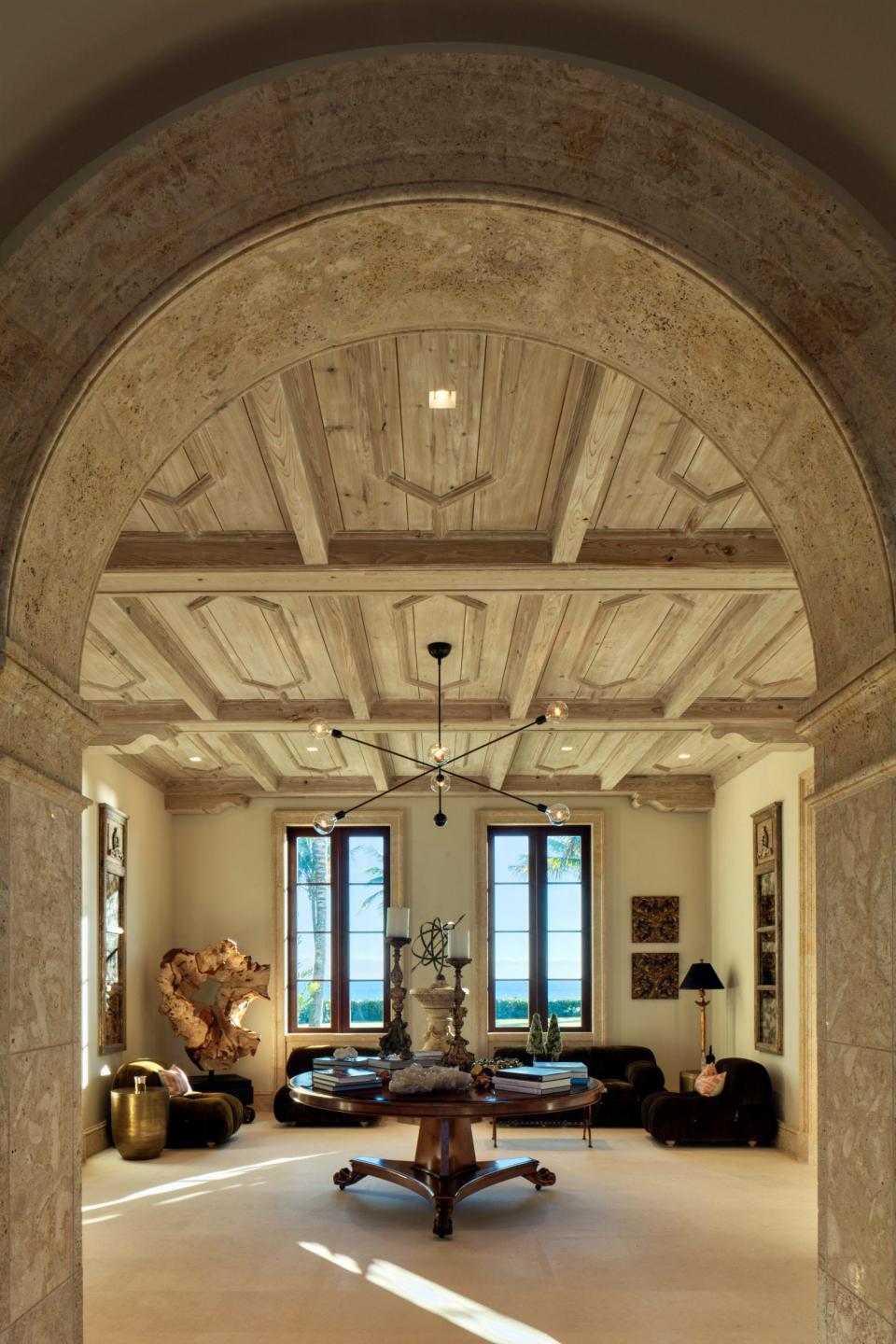 When limewash is used inside, as it was on the ceiling of this entry hall in Palm Beach, Florida, it creates a dreamy, Old World feel.