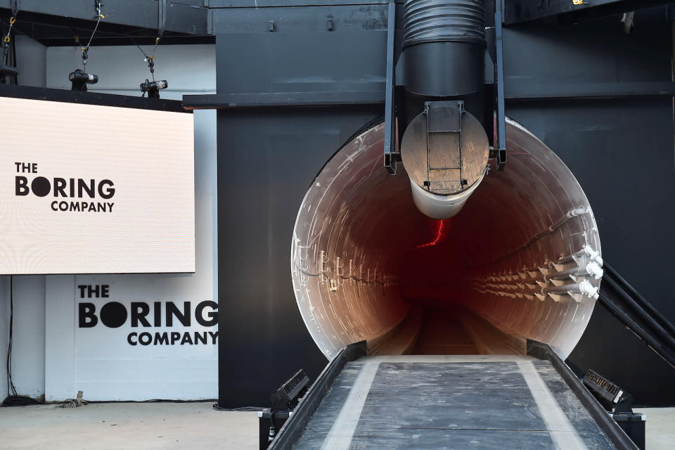 The Boring Company unveils the first test tunnel of a proposed underground transportation network across Los Angeles County during an event in Hawthorne, California, U.S. December 18, 2018.        Robyn Beck/Pool via REUTERS - RC1170BD0600