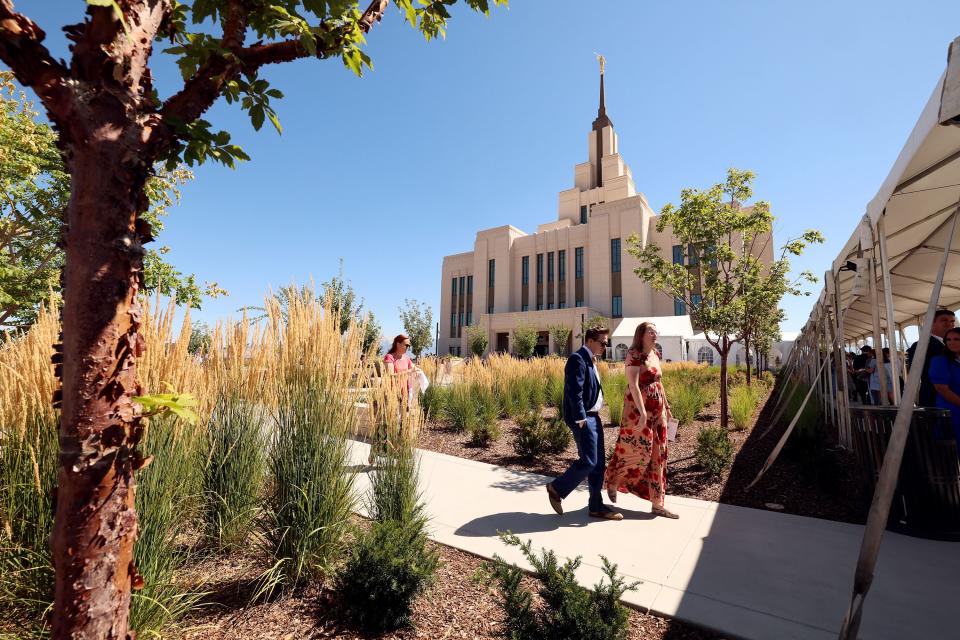 People walk after the first session of the dedication of the Saratoga Springs Utah Temple in Saratoga Springs, Utah, on Sunday, Aug. 13, 2023. | Scott G Winterton, Deseret News