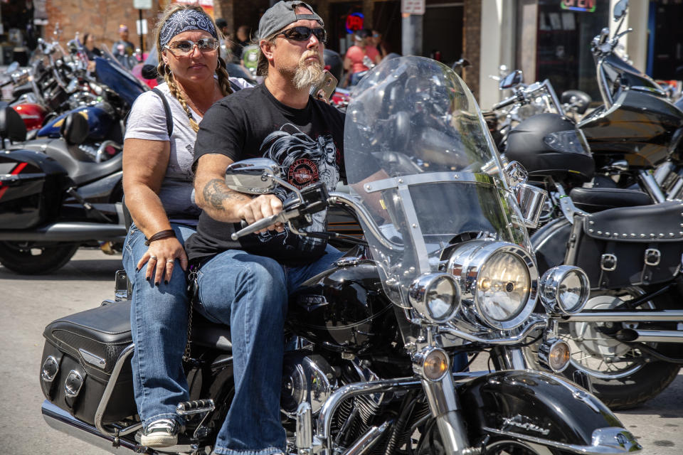 Bikers ride down Main Street during the 80th annual Sturgis Motorcycle Rally on Saturday, Aug. 15, 2020, in Sturgis, S.D. (Amy Harris/Invision/AP)