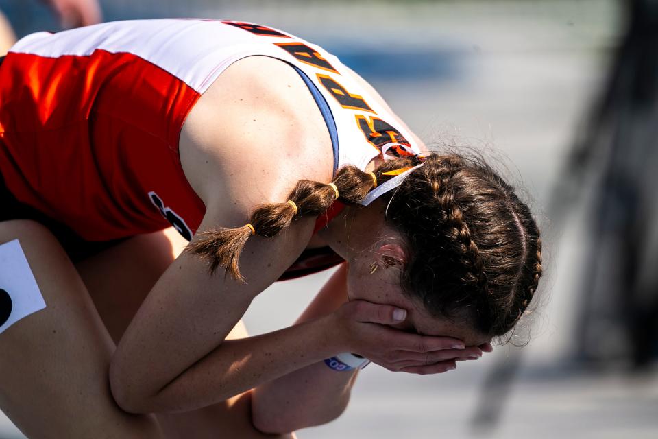 Solon's Gracie Federspiel reacts after winning the Class 3A girls 800 meter run during the high school state track and field championships Saturday.