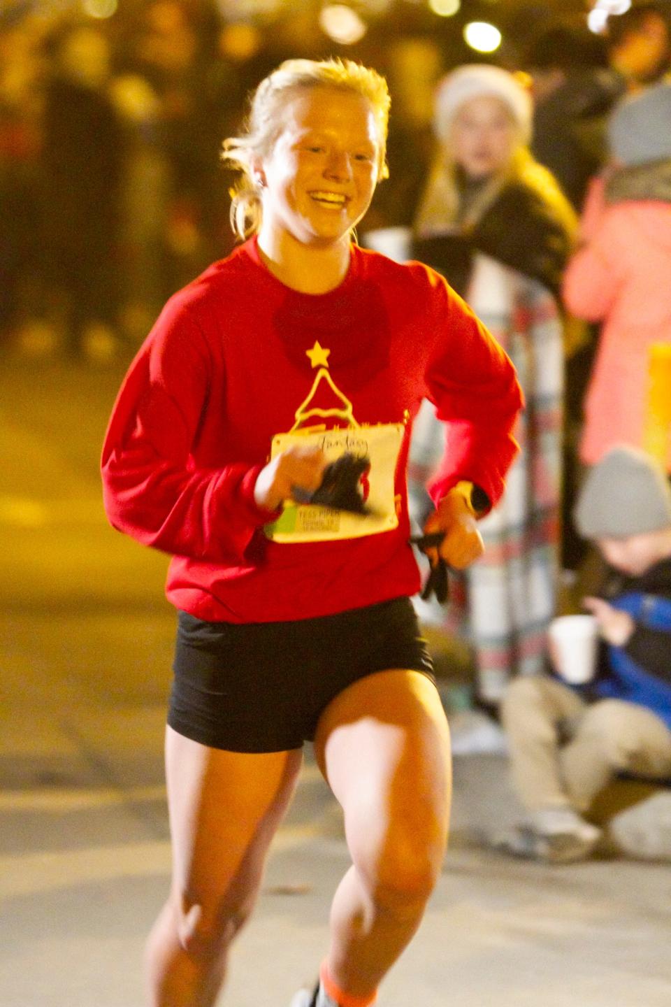 Tess Piper of Brighton was the women's winner in the Fantasy of Lights 5K Friday, Nov. 25, 2022 in Howell.