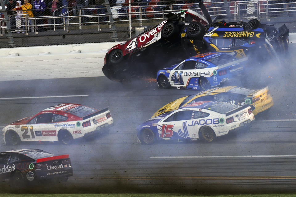 NASCAR Cup Series driver's Ryan Preece (41) Josh Berry (4) and Corey LaJoie (7), upside down, crash on the final lap during a NASCAR Cup Series auto race at Talladega Superspeedway, Sunday, April 21, 2024, in Talladega. Ala. (AP Photo/Butch Dill)