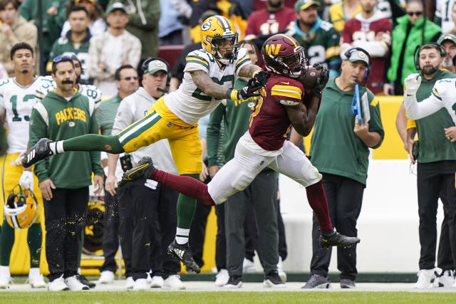 Green Bay Packers cornerback Eric Stokes (21) in action during the second  half of an NFL football game against the Washington Commanders, Sunday, Oct.  23, 2022, in Landover, Md. (AP Photo/Patrick Semansky