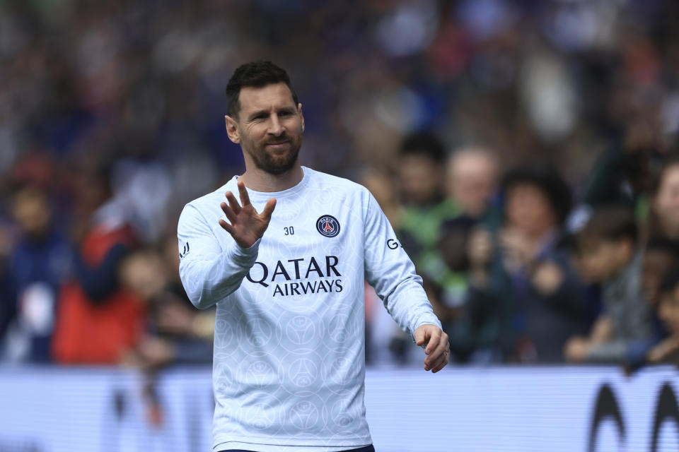 PSG's Lionel Messi gestures as he warms up before the French League One soccer match between Paris Saint-Germain and Lorient, at the Parc des Princes stadium in Paris, Sunday, April 30, 2023. (AP Photo/Aurelien Morissard)