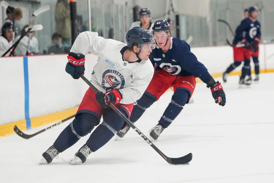 Jul. 13, 2022; Lewis Center, OH USA;  Columbus Blue Jackets defenseman Denton Mateychuk (5) looks to move the puck during development camp at the OhioHealth Chiller North in Lewis Center on July 13, 2022. Mandatory Credit: Adam Cairns-The Columbus Dispatch