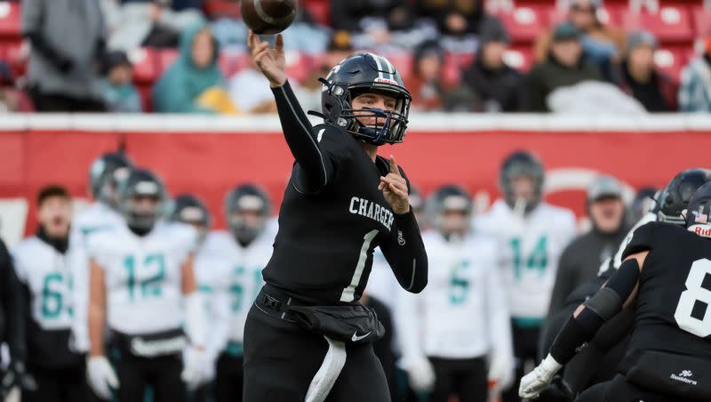 Corner Canyon quarterback Isaac Wilson throws during a 6A football semifinal game against Farmington at Rice-Eccles Stadium in Salt Lake City on Thursday, Nov. 10, 2022.