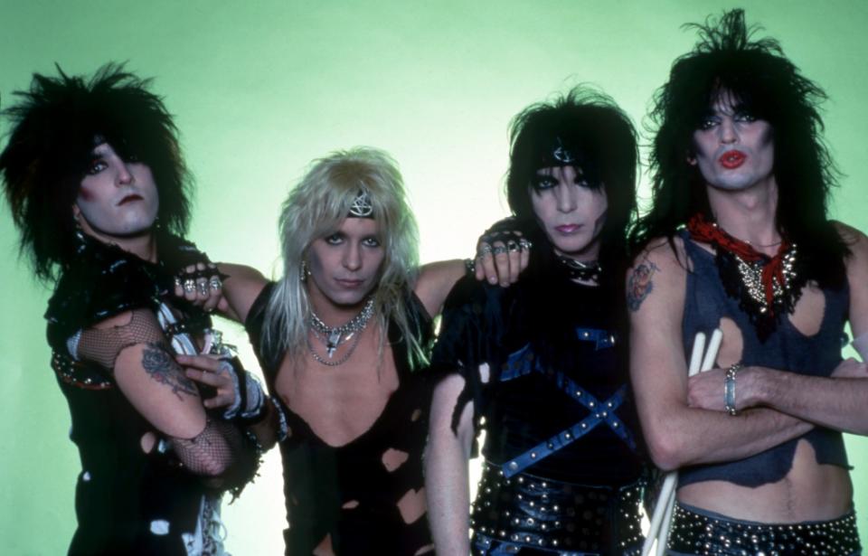 DETROIT, MI - MARCH 6: (L-R) Bassist Nikki Sixx, lead singer Vince Neil, lead guitarist Mick Mars and drummer Tommy Lee of the American hard rock band Motley Crue pose for a studio portrait during Ozzy Osbourne's Bark at the Moon Tour on March 6, 1984, at Joe Louis Arena in Detroit, Michigan. (Photo by Ross Marino/Getty Images)