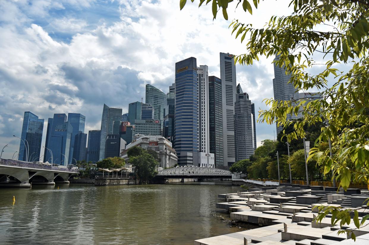 This picture taken on January 2, 2019 shows the skyline of the financial business district in Singapore. (Photo by Roslan RAHMAN / AFP)        (Photo credit should read ROSLAN RAHMAN/AFP/Getty Images)