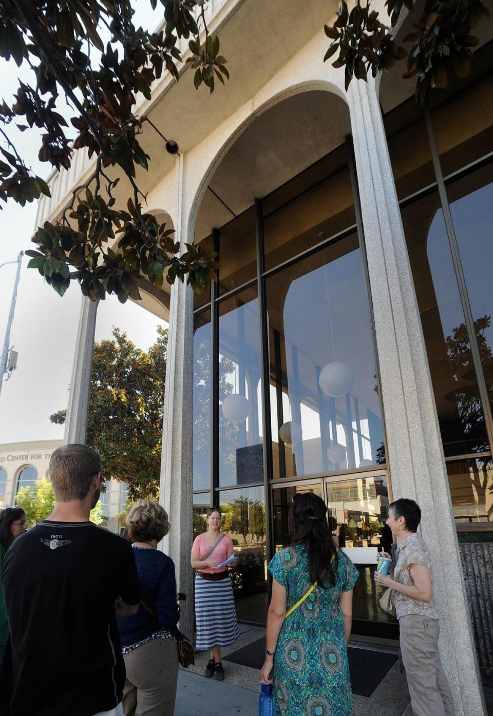 In this September 2012 photo, Ilse Craane, talks about the formerly Wachovia bank building during a walking tour of downtown Modesto Modernist buildings.