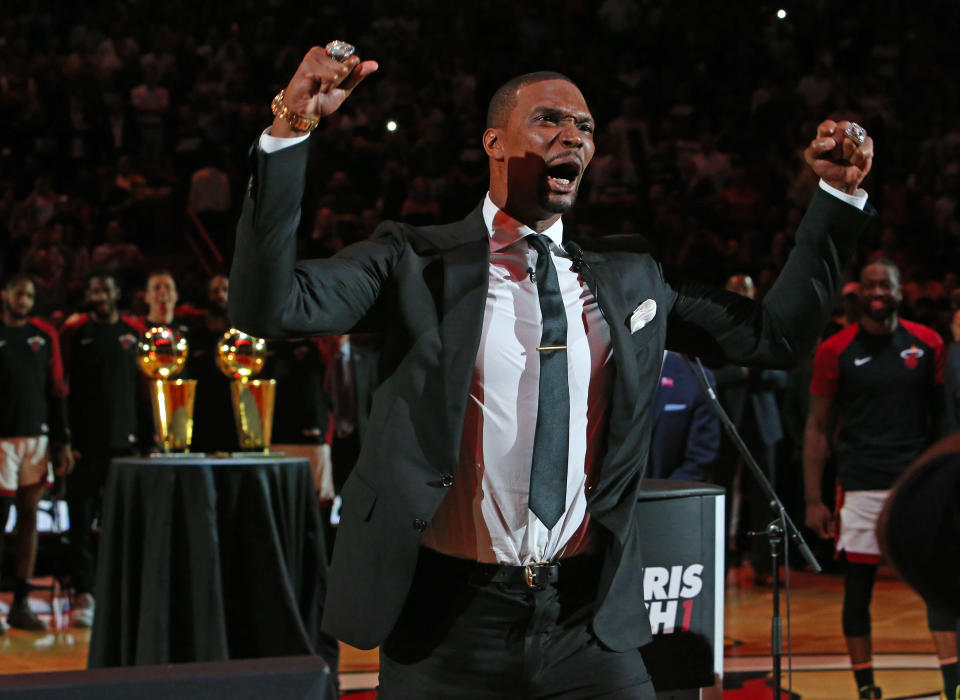 Former Miami Heat Chris Bosh reacts after his ceremony to retire his number at halftime of an NBA basketball game against the Orlando Magic at the AmericanAirlines Arena on Tuesday, March 26, 2019 in Miami.  (David Santiago/Miami Herald/TNS via Getty Images)