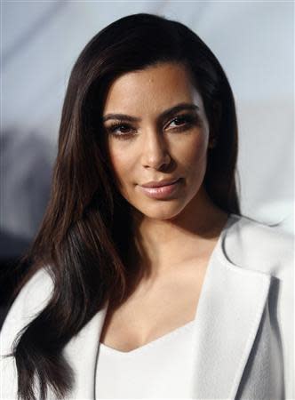 U.S. television personality Kim Kardashian poses during a news conference in Vienna February 27, 2014. REUTERS/Heinz-Peter Bader