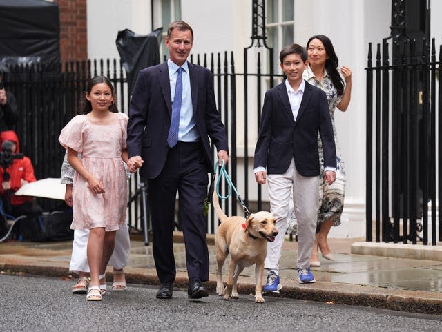 Outgoing Conservative chancellor of the exchequer Jeremy Hunt, with his wife Lucia and their children Jack, Anna and Eleanor, leaves 11 Downing Street after Labour's victory