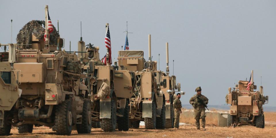 American military convoy stops near the town of Tel Tamr, north Syria, Sunday, Oct. 20, 2019.