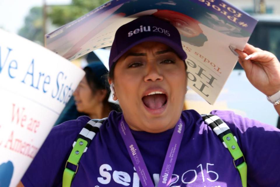 An SEIU member joined about three dozen demonstrators at the Clovis office of House Speaker Kevin McCarthy in support of immigration reform on Sept. 1, 2023.