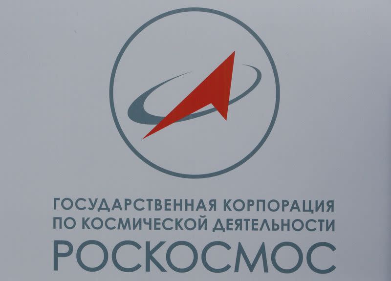 FILE PHOTO: The logo of Russian space agency Roscosmos is seen on a board at the SPIEF 2017 in St. Petersburg