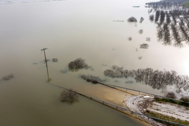 A submerged road in the newly formed Lake Karla, which used to be farmland (Angelos TZORTZINIS)