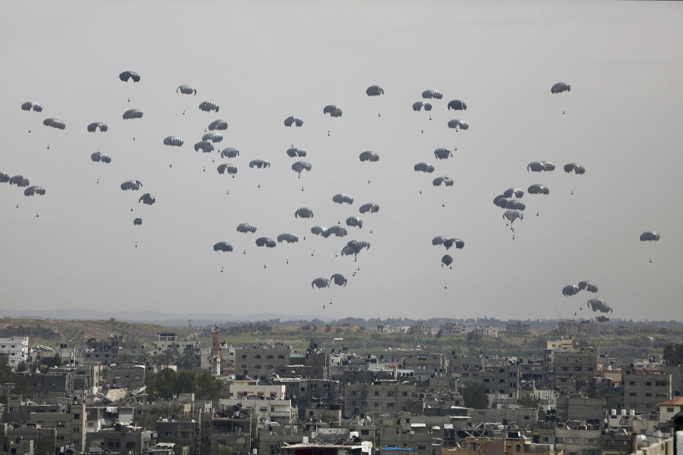 Humanitarian aid is airdropped to Palestinians in Gaza City, Gaza Strip, on Sunday, March 17, 2024. (AP Photo/Mohammed Hajjar)