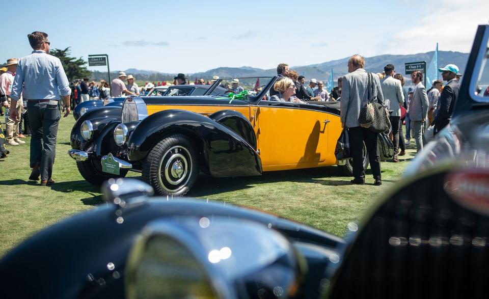 <p>Okay, it feels like cheating to pick a Bugatti Type 57C as one of our favorites from Pebble Beach, but here we are. The <a href="https://www.caranddriver.com/news/a26555686/bugatti-la-voiture-noire-photos-info/" rel="nofollow noopener" target="_blank" data-ylk="slk:Type 57SC Atlantic;elm:context_link;itc:0;sec:content-canvas" class="link ">Type 57SC Atlantic</a>, a coupe, is such a fixture in the world of high-value car shows that you forget Bugatti <em>also</em> made open-top Type 57s. This example is a stunner with its two-tone paint job and perfect brightwork. A similar Type 57C Stelvio by Gangloff sold this weekend <a href="https://www.goodingco.com/vehicle/1938-bugatti-type-57c-stelvio/" rel="nofollow noopener" target="_blank" data-ylk="slk:at the Gooding & Co. auction;elm:context_link;itc:0;sec:content-canvas" class="link ">at the Gooding & Co. auction</a> for $1.3 million.<em>—Mike Magrath</em></p>