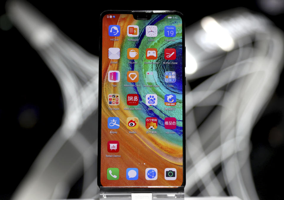 The new 'Huawei Mate 30' of China's smartphone manufacturer Huawei is displayed during an event in Munich, Germany, Thursday, Sept. 19, 2019. (AP Photo/Matthias Schrader)