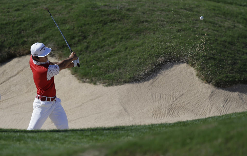 Richard Lee hits from a sand trap on the 15th hole during the second round of the Texas Open golf tournament on Friday, March 28, 2014, in San Antonio. (AP Photo/Eric Gay)