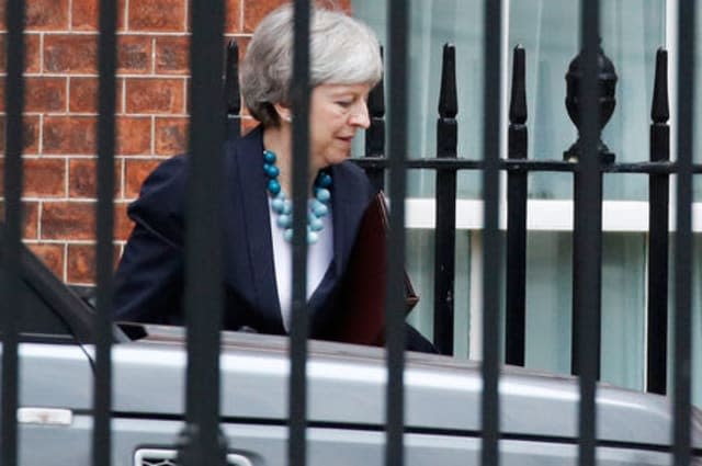 Britain's Prime Minister Theresa May leaves Downing Street in London