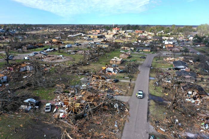 In an aerial view, piles of debris remain where homes once stood before Friday's EF-4 tornado