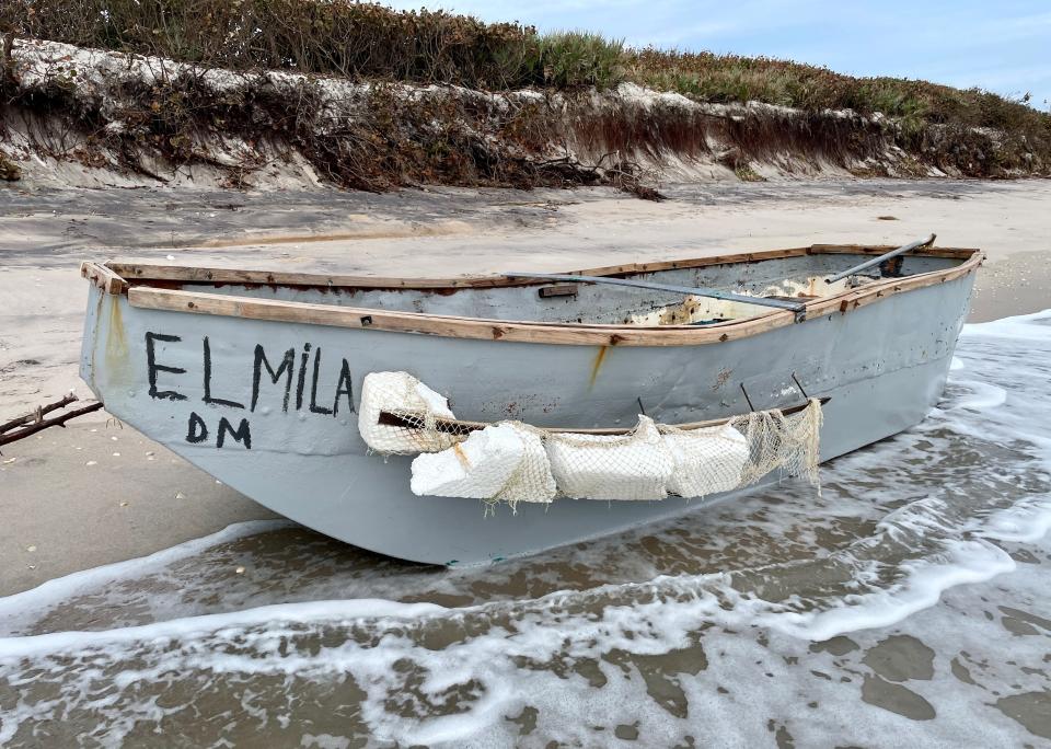 A view of the possible migrant vessel with the heavily eroded dunes of Juan Ponce de Leon Landing in the background, thanks to Hurricane Nicole's passage.