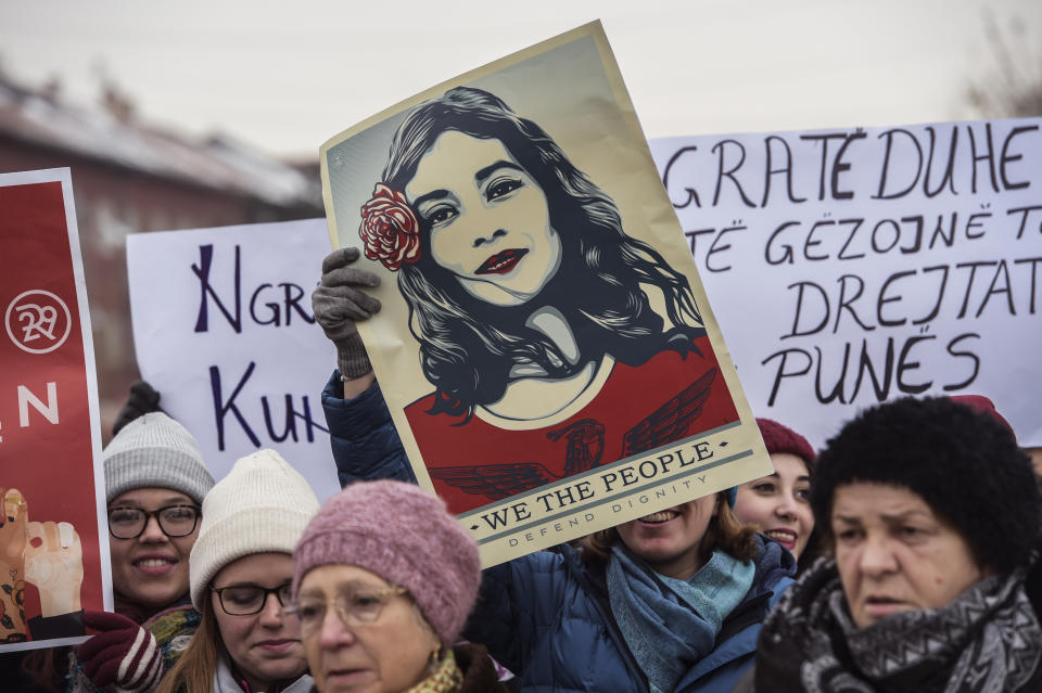 Women hold posters as they take part in a march for women's rights and freedom in solidarity with the march organized&nbsp;in Washington, on January 21, 2017 in Pristina. Hundreds of thousands of protesters spearheaded by women's rights groups are set to converge on Washington to send a defiant message to America's new president, Donald Trump.