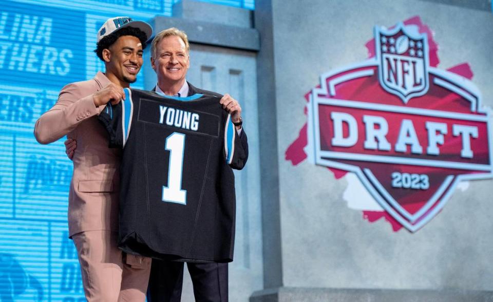 Alabama quarterback Bryce Young poses for photos with NFL Commissioner Roger Goodell after being picked first overall by the Carolina Panthers during the NFL Draft outside of Union Station on Thursday, April 27, 2023, in Kansas City.