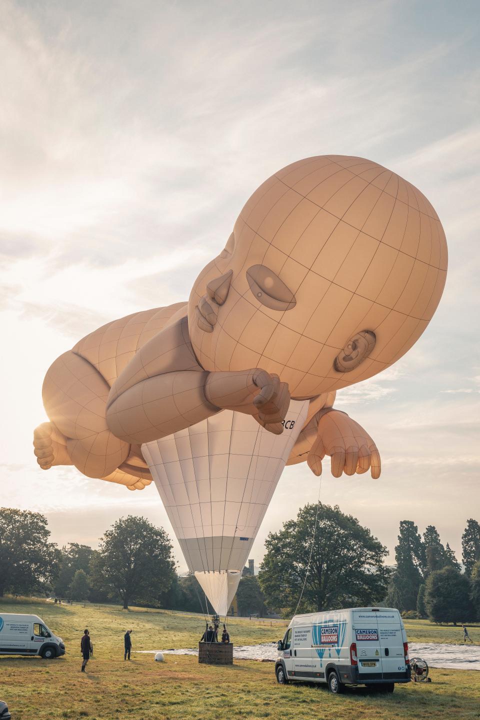 On Make Music Milwaukee day June 21, "Baby You," a 112-foot long hot air balloon, will fly over Veterans Park as a choir sings.