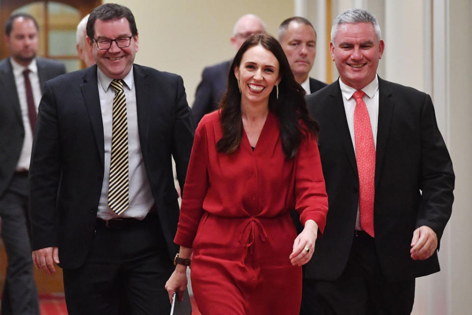 <p>Jacinda Ardern, center, after her party’s October victory. She is the third woman to lead her country. (Photo: Getty Images) </p>