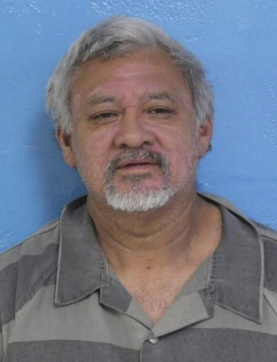 This booking photo provided the Kingsport, Tenn., Police Department shows Saul A. Carrera. Carrera, the driver of a tractor-trailer that hit a van alongside an interstate in East Tennessee on Sunday, March 26, 2023, killing four people who were changing a tire and critically injuring another, was impaired, police said. (Kingsport Police Department via AP)