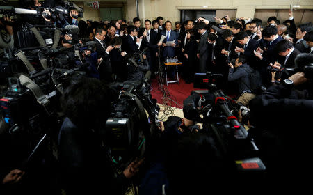 Japan's Deputy Prime Minister and Finance Minister Taro Aso speaks to the media at the Finance Ministry in Tokyo, Japan March 12, 2018. REUTERS/Toru Hanai