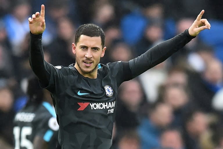 Chelsea's midfielder Eden Hazard celebrates after scoring their third goal during the English Premier League football match against Brighton and Hove Albion January 20, 2018