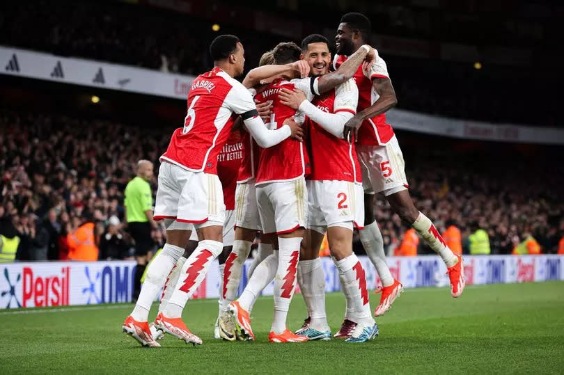 Arsenal celebrate scoring against Chelsea