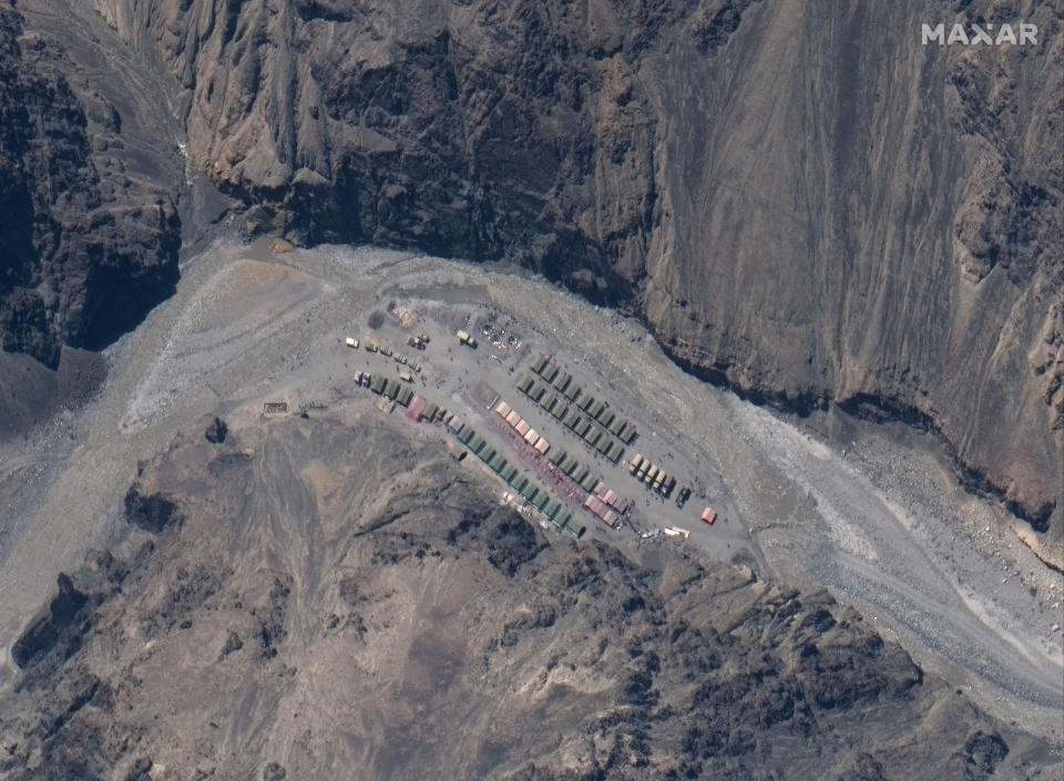 This May 22, 2020, satellite image provided by Maxar Technologies shows China's People's Liberation Army (PLA) base in the Galwan Valley in Line of Actual Control, the border between India and China. Chinese and Indian military commanders agreed to disengage their forces in the disputed area of the Himalayas following a clash that left at least 20 soldiers dead, both countries said Tuesday, June 23, 2020. The commanders reached the agreement Monday, June 22, 2020 in their first meeting since the June 15 confrontation, the countries said. (Maxar Technologies via AP)