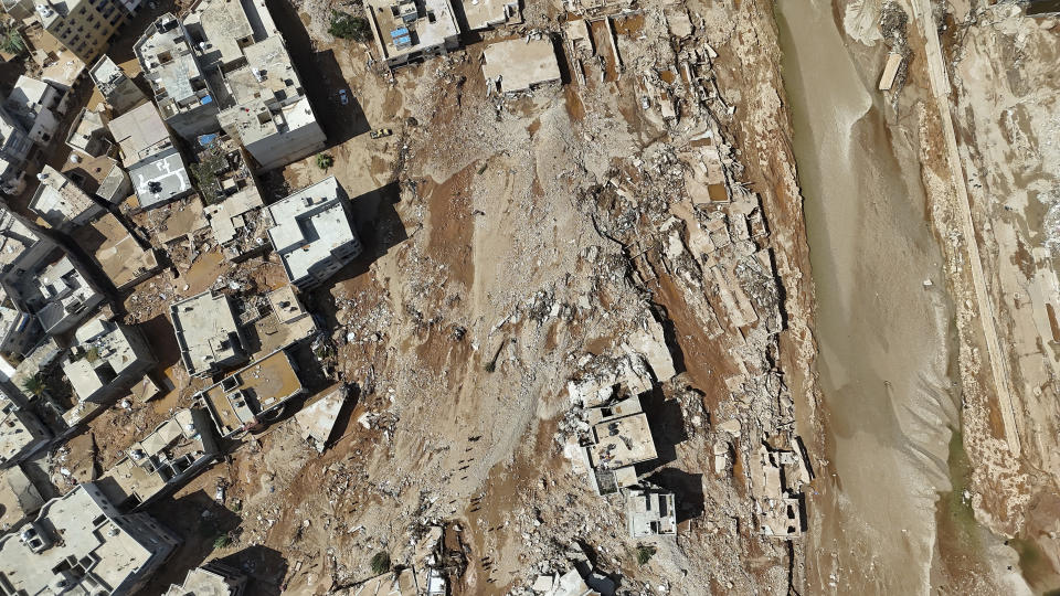 A general view of the flooded city of Derna, Libya, is seen Wednesday, Sept. 13, 2023. The rainwater that gushed down Derna's mountainside and into the city has killed thousands and left thousands more missing, washing entire neighborhoods out to sea. AP Photo/Muhammad J. Elalwany)