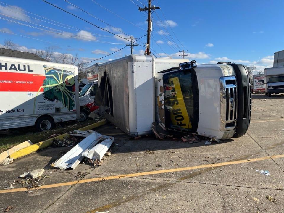 High-speed winds flipped trucks and tore down walls at a U-Haul facility in Hendersonville on Saturday.