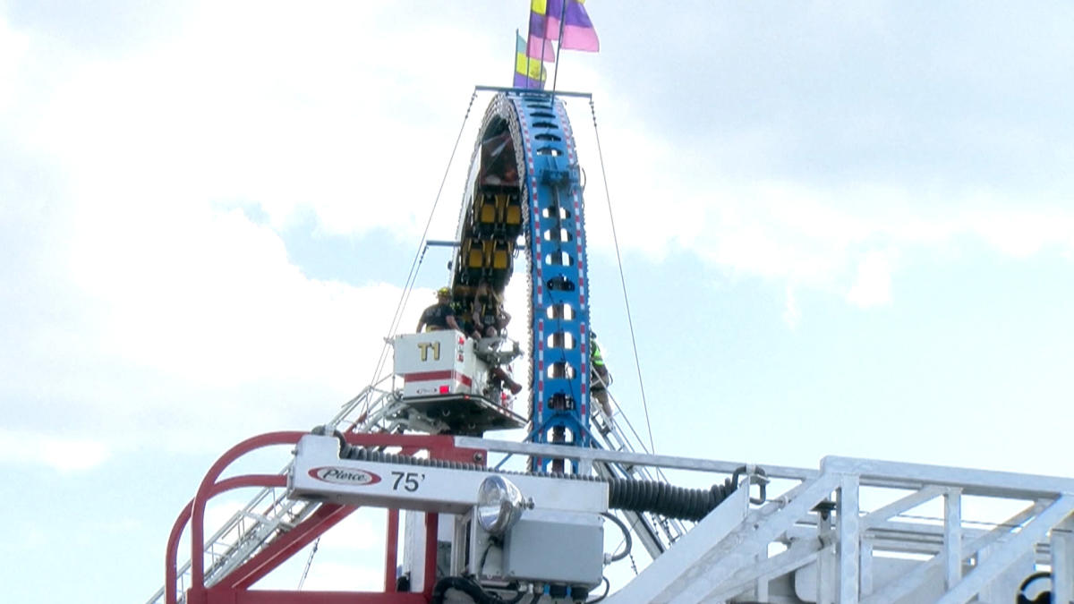 Roller coaster riders stuck upside down for hours after 'mechanical